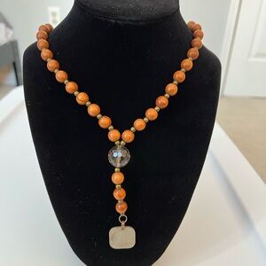 Long Boho Brown Wooden Bead Necklace with Griffin Pendant